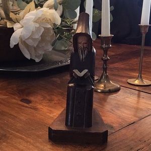 Hand carved praying monk